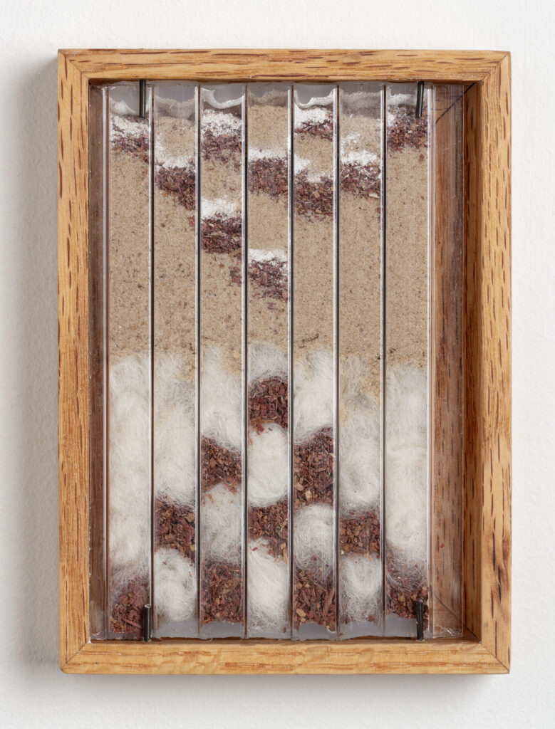 Abby Flanagan, tract (woodthrush) 11, 2023, polycarbonate panel, sand, wool, sawdust, plaster, artist’s oak frame, 5 ¾ x 4 ¼ in.