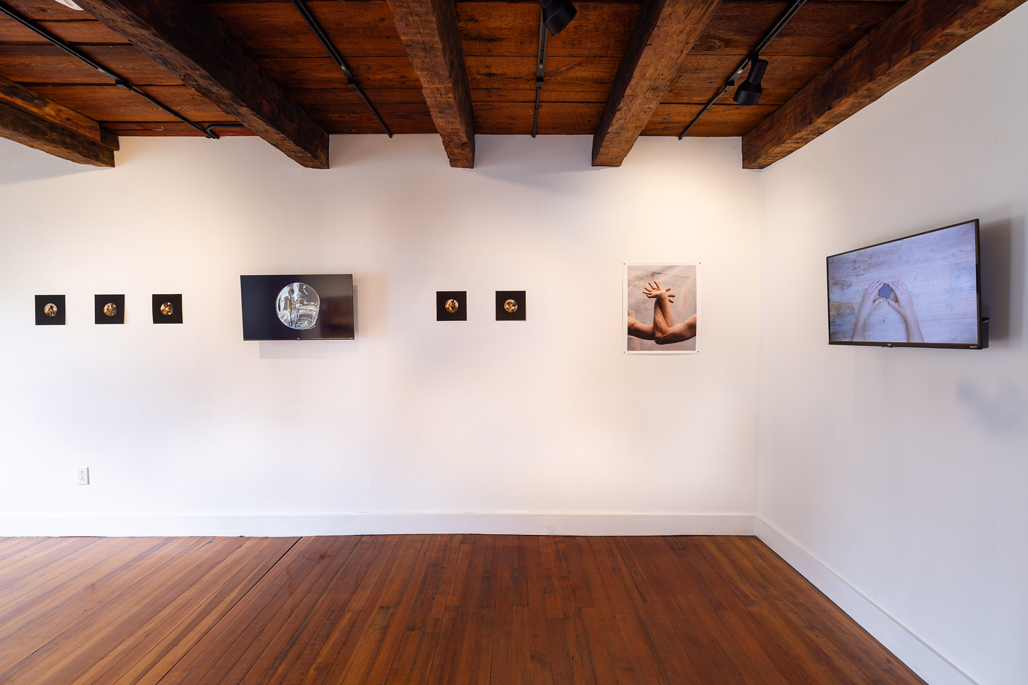 Installation view, works by Rodell Warner and Phoebe Shuman-Goodier.