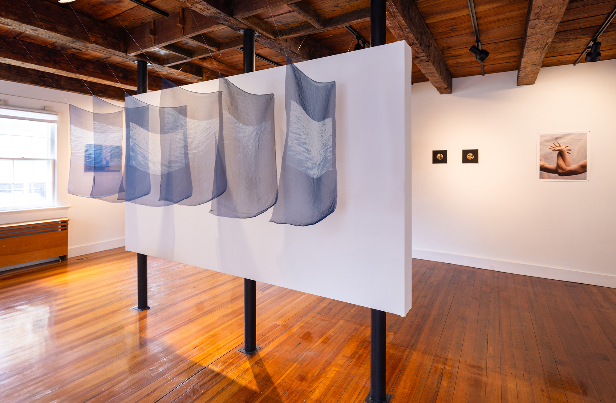 Installation view, works by Ariana Gomez and Phoebe Shuman-Goodier